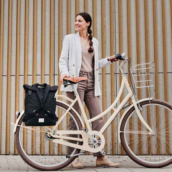 woman standing with city bikepack black